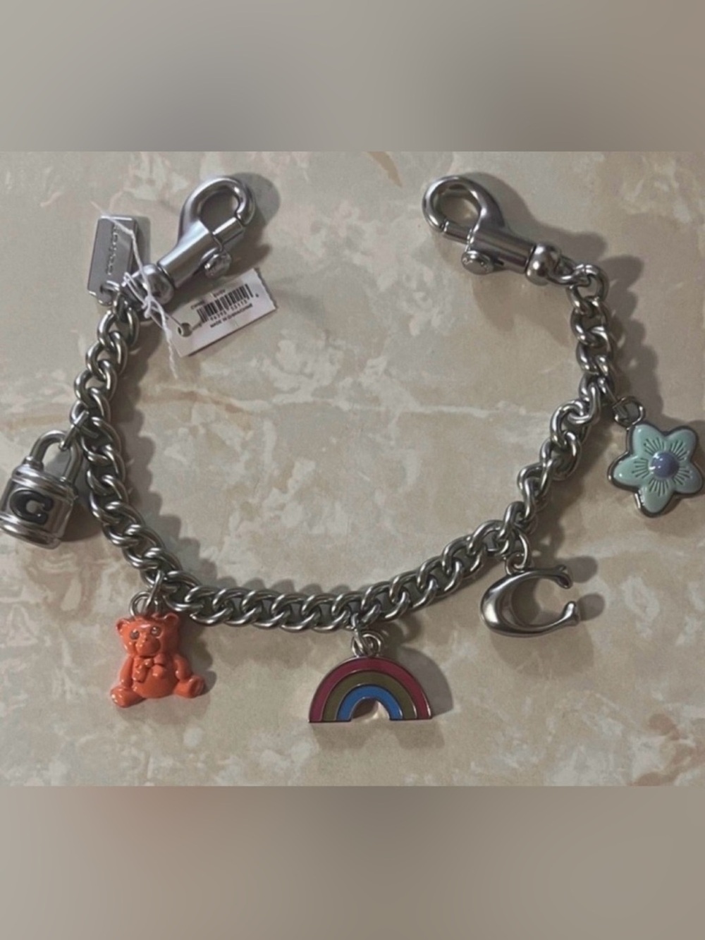 Silver COACH Strap with Charms